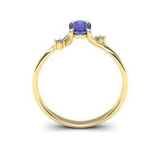 1/2 Carat Oval Shape Tanzanite and Two Diamond Accent Ring In 14 Karat Yellow Gold