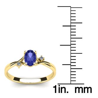1/2 Carat Oval Shape Tanzanite and Two Diamond Accent Ring In 14 Karat Yellow Gold