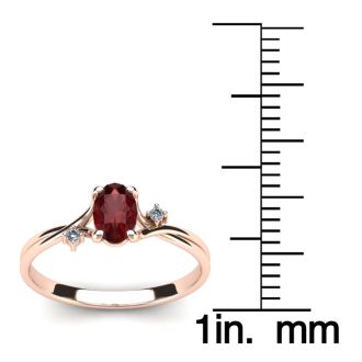 Garnet Ring: Garnet Jewelry: 1/2 Carat Oval Shape Garnet and Two Diamond Accent Ring In 14 Karat Rose Gold