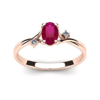 1/2 Carat Oval Shape Ruby and Two Diamond Accent Ring In 14 Karat Rose Gold