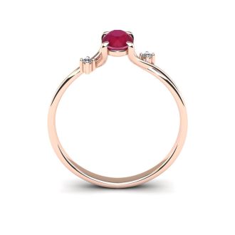 1/2 Carat Oval Shape Ruby and Two Diamond Accent Ring In 14 Karat Rose Gold