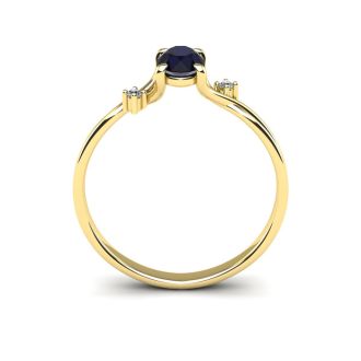 1/2 Carat Oval Shape Sapphire and Two Diamond Accent Ring In 14 Karat Yellow Gold