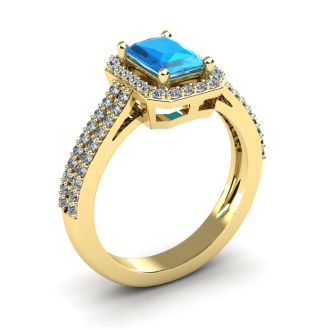 1 1/2 Carat Blue Topaz and Halo Diamond Ring In 14 Karat Yellow Gold