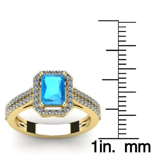 1 1/2 Carat Blue Topaz and Halo Diamond Ring In 14 Karat Yellow Gold