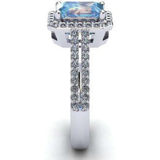 Aquamarine Ring: Aquamarine Jewelry: 1 1/3 Carat Aquamarine and Halo Diamond Ring In 14 Karat White Gold