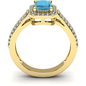 Aquamarine Ring: Aquamarine Jewelry: 1 1/3 Carat Aquamarine and Halo Diamond Ring In 14 Karat Yellow Gold