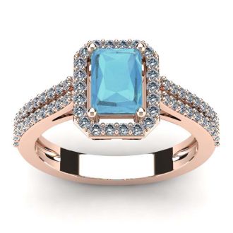 Aquamarine Ring: Aquamarine Jewelry: 1 1/3 Carat Aquamarine and Halo Diamond Ring In 14 Karat Rose Gold