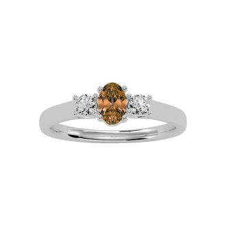 1/2 Carat Oval Shape Citrine and Two Diamond Ring In 14 Karat White Gold