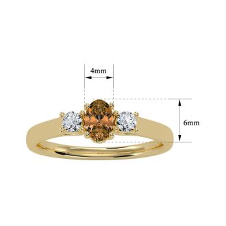 1/2 Carat Oval Shape Citrine and Two Diamond Ring In 14 Karat Yellow Gold