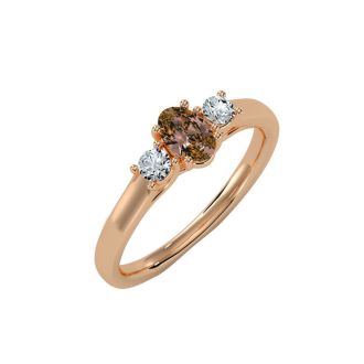 1/2 Carat Oval Shape Citrine and Two Diamond Ring In 14 Karat Rose Gold