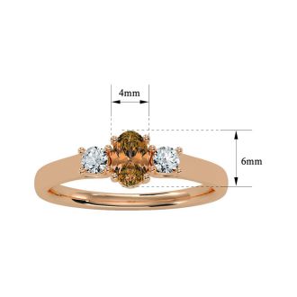 1/2 Carat Oval Shape Citrine and Two Diamond Ring In 14 Karat Rose Gold