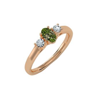 3/4 Carat Oval Shape Peridot and Two Diamond Ring In 14 Karat Rose Gold