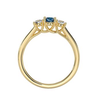 3/4 Carat Oval Shape Blue Topaz and Two Diamond Ring In 14 Karat Yellow Gold
