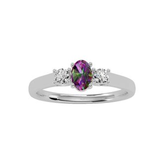 3/4 Carat Oval Shape Mystic Topaz Ring With Two Diamonds In 14 Karat White Gold