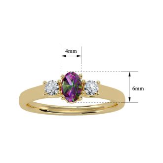 3/4 Carat Oval Shape Mystic Topaz and Two Diamond Ring In 14 Karat Yellow Gold