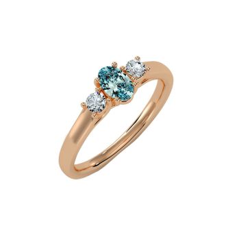 Aquamarine Ring: Aquamarine Jewelry: 1/2 Carat Oval Shape Aquamarine and Two Diamond Ring In 14 Karat Rose Gold