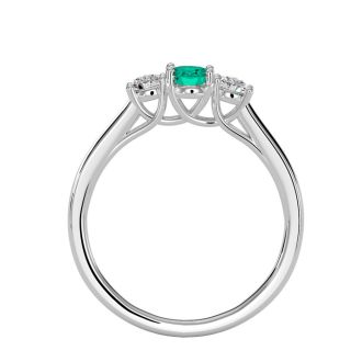 1/2 Carat Oval Shape Emerald and Two Diamond Ring In 14 Karat White Gold