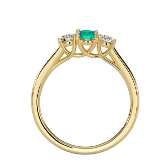 1/2 Carat Oval Shape Emerald and Two Diamond Ring In 14 Karat Yellow Gold
