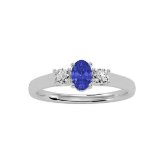 3/4 Carat Oval Shape Tanzanite and Two Diamond Ring In 14 Karat White Gold