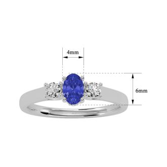 3/4 Carat Oval Shape Tanzanite and Two Diamond Ring In 14 Karat White Gold