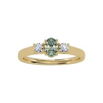 1/2 Carat Oval Shape Green Amethyst and Two Diamond Ring In 14 Karat Yellow Gold