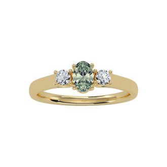 1/2 Carat Oval Shape Green Amethyst and Two Diamond Ring In 14 Karat Yellow Gold
