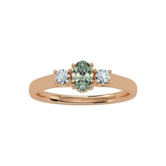 1/2 Carat Oval Shape Green Amethyst and Two Diamond Ring In 14 Karat Rose Gold