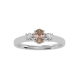 1/2 Carat Oval Shape Morganite and Two Diamond Ring In 14 Karat White Gold