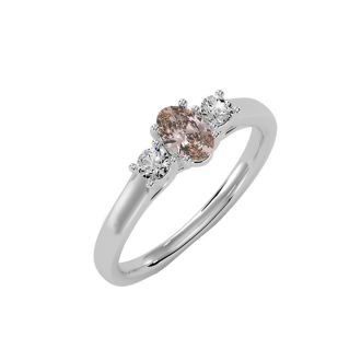 1/2 Carat Oval Shape Morganite and Two Diamond Ring In 14 Karat White Gold