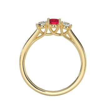 3/4 Carat Oval Shape Ruby and Two Diamond Ring In 14 Karat Yellow Gold
