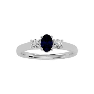3/4 Carat Oval Shape Sapphire and Two Diamond Ring In 14 Karat White Gold