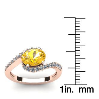 1 1/3 Carat Oval Shape Citrine and Halo Diamond Ring In 14 Karat Rose Gold