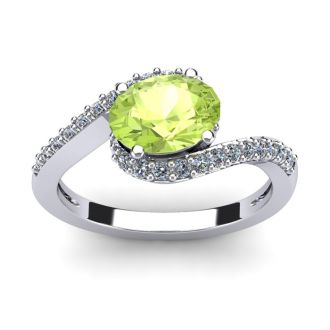 1 1/2 Carat Oval Shape Peridot and Halo Diamond Ring In 14 Karat White Gold