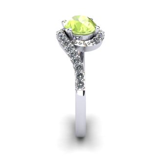 1 1/2 Carat Oval Shape Peridot and Halo Diamond Ring In 14 Karat White Gold