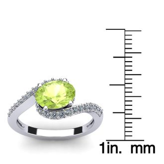 1 1/2 Carat Oval Shape Peridot and Halo Diamond Ring In 14 Karat White Gold