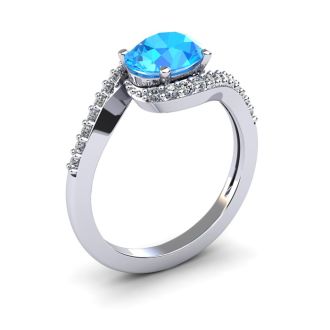 1 3/4 Carat Oval Shape Blue Topaz and Halo Diamond Ring In 14 Karat White Gold
