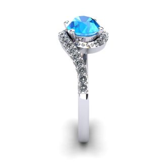 1 3/4 Carat Oval Shape Blue Topaz and Halo Diamond Ring In 14 Karat White Gold