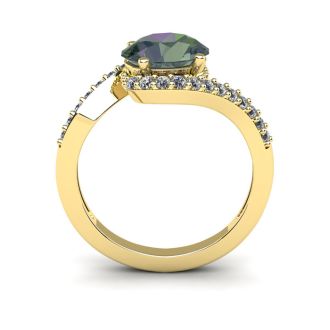1-3/4 Carat Oval Shape Mystic Topaz Ring With Swirling Diamond Design In 14 Karat Yellow Gold