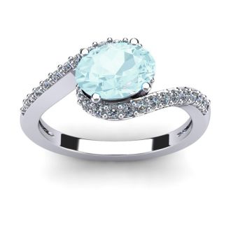 Aquamarine Ring: Aquamarine Jewelry: 1 1/2 Carat Oval Shape Aquamarine and Halo Diamond Ring In 14 Karat White Gold