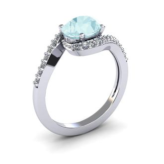 Aquamarine Ring: Aquamarine Jewelry: 1 1/2 Carat Oval Shape Aquamarine and Halo Diamond Ring In 14 Karat White Gold