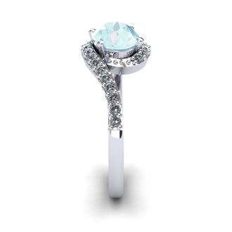Aquamarine Ring: Aquamarine Jewelry: 1 1/2 Carat Oval Shape Aquamarine and Halo Diamond Ring In 14 Karat White Gold