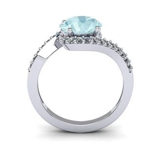 Aquamarine Ring: Aquamarine Jewelry: 1 1/2 Carat Oval Shape Aquamarine and Halo Diamond Ring In 14 Karat White Gold