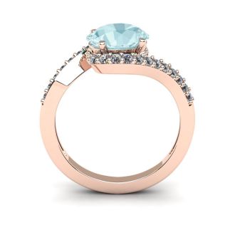 Aquamarine Ring: Aquamarine Jewelry: 1 1/2 Carat Oval Shape Aquamarine and Halo Diamond Ring In 14 Karat Rose Gold