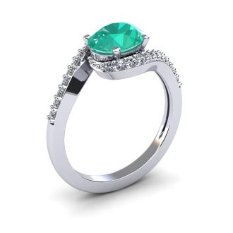 1 1/2 Carat Oval Shape Emerald and Halo Diamond Ring In 14 Karat White Gold