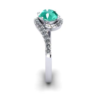 1 1/2 Carat Oval Shape Emerald and Halo Diamond Ring In 14 Karat White Gold
