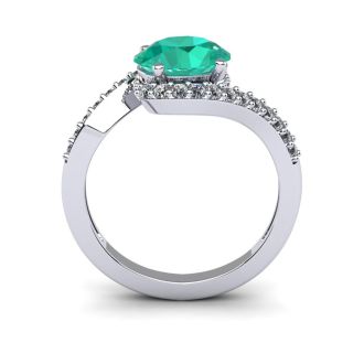 1 1/2 Carat Oval Shape Emerald and Halo Diamond Ring In 14 Karat White Gold