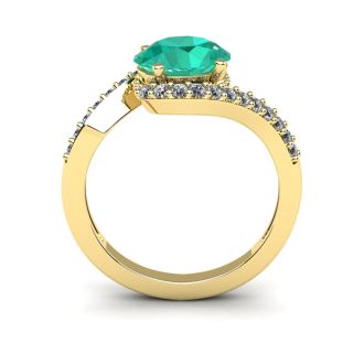1 1/2 Carat Oval Shape Emerald and Halo Diamond Ring In 14 Karat Yellow Gold