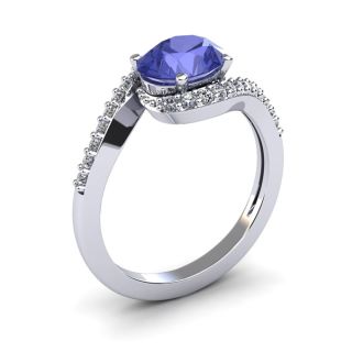 1 1/2 Carat Oval Shape Tanzanite and Halo Diamond Ring In 14 Karat White Gold