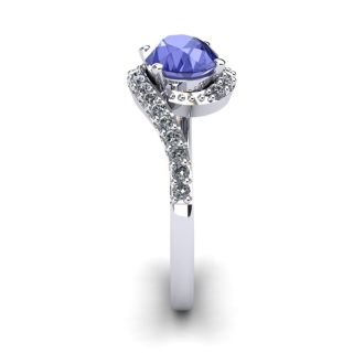 1 1/2 Carat Oval Shape Tanzanite and Halo Diamond Ring In 14 Karat White Gold
