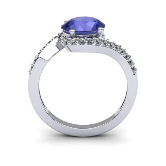 1 1/2 Carat Oval Shape Tanzanite and Halo Diamond Ring In 14 Karat White Gold